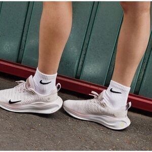 Nike Pink and White Sneakers with Air Max Cushioning